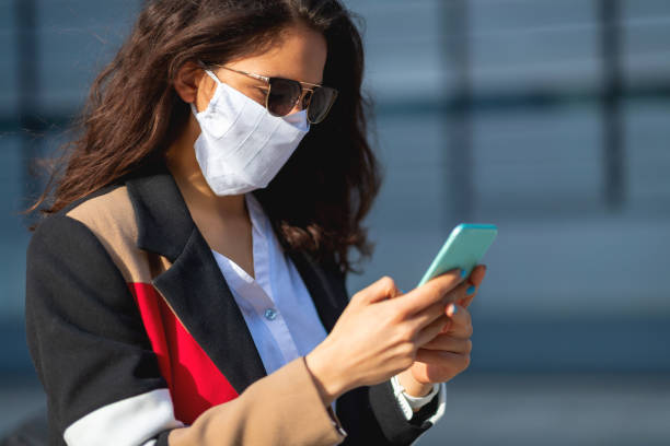 istock Woman with protective face mask 1214966851