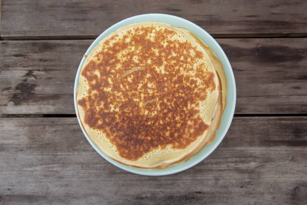 istock homemade Russian pancakes on yeast dough 1214970060