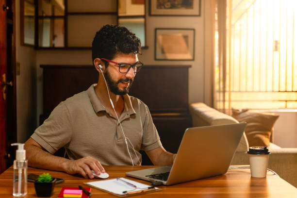 istock Hispanic model performing video conference. Concept working at home 1214972208