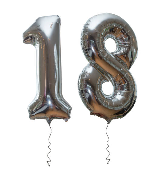 istock Silver number 18 party balloons isolated on a white background 1214972844