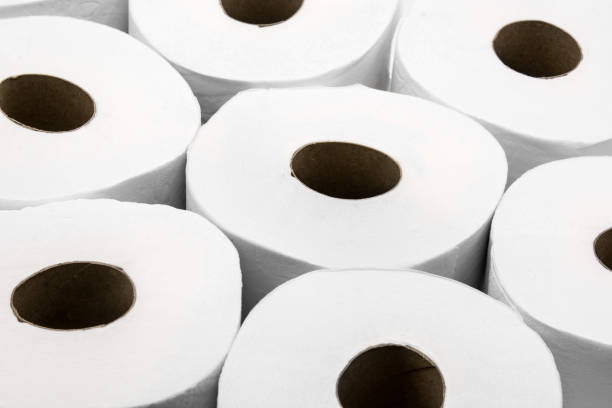 istock Toilet paper rolls background 1214973719