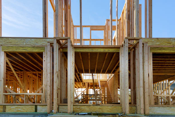 istock New home construction framing of a house 1214973854