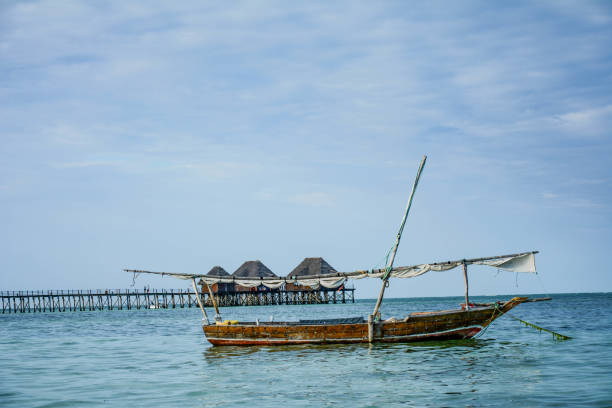 istock Passenger boat anchored near beach, Indian ocean 1214973954
