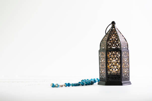 istock Ramadan Lantern and Blue rosary beads isolated on a white background. 1214977067