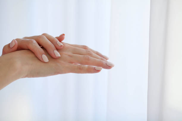 istock Beautiful female hands. Female hands Application Cream, Lotion. 1214979073