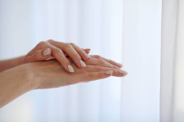 istock Beautiful female hands. Female hands Application Cream, Lotion. 1214979131