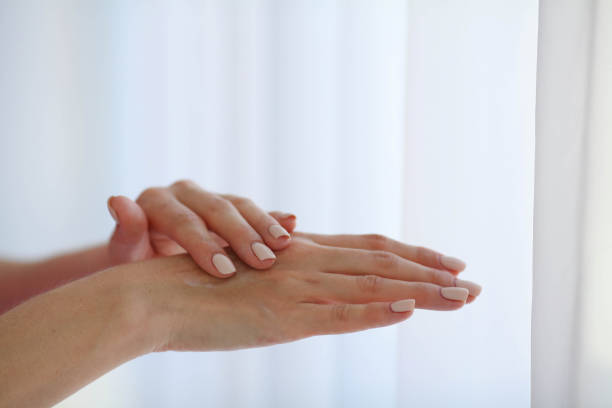 istock Beautiful female hands. Female hands Application Cream, Lotion. 1214979217