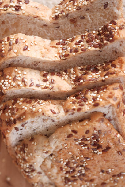 istock Sliced whole grain bread with oat flakes. Wholemeal bread 1214980695