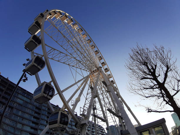 istock Ferris wheel against the sky seen from below in rotterdam 1214982482