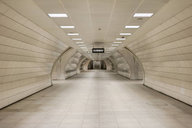 An abstract perspective view of underground subway station hallway tunnel with escalator