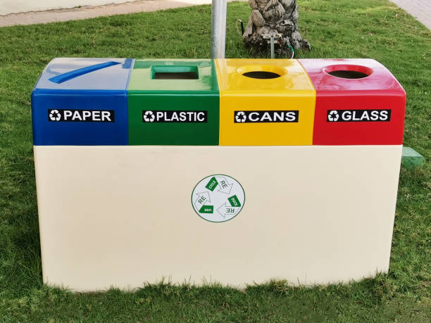 istock Recycling of garbage separation and recycling concept. Colorful bins for different garbage with sorted garbage vector icons. 1214984472
