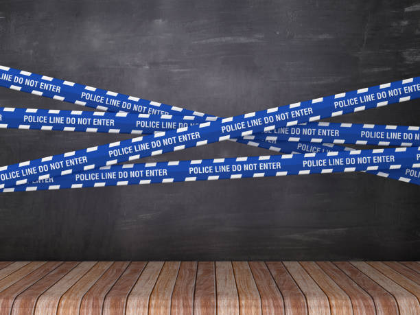 istock Cordon Tapes with POLICE LINE DO NOT ENTER on Chalkboard Background - 3D Rendering 1214985934