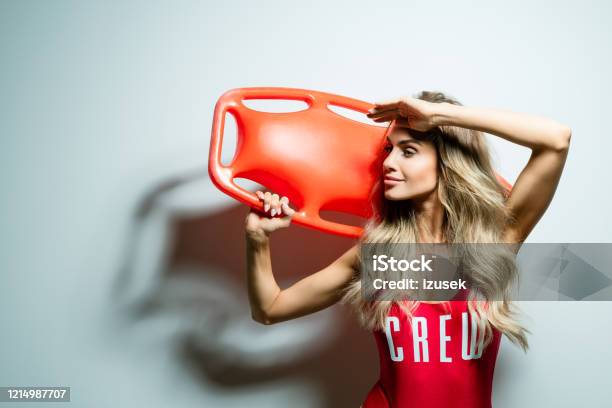 Summer Portrait Of Young Woman Holding Rescue Buoy Stock Photo - Download Image Now - Buoy, One Person, People