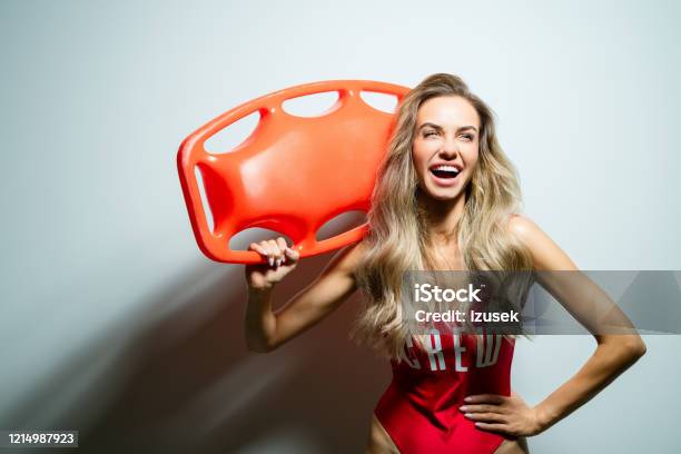 Summer Portrait Of Young Woman Holding Rescue Buoy Stock Photo - Download Image Now - Portrait, Adult, Adults Only