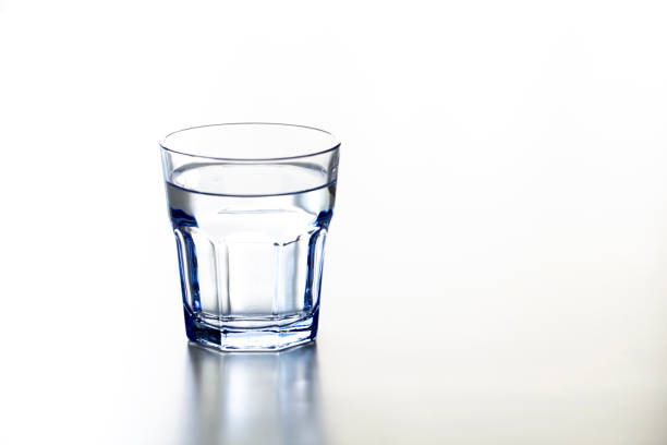 istock A Glass of Drinking Water Isolated on White Background 1214989423