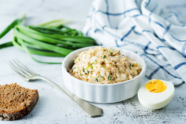 istock Canned Tuna red onion egg salad on the plate 1214990438