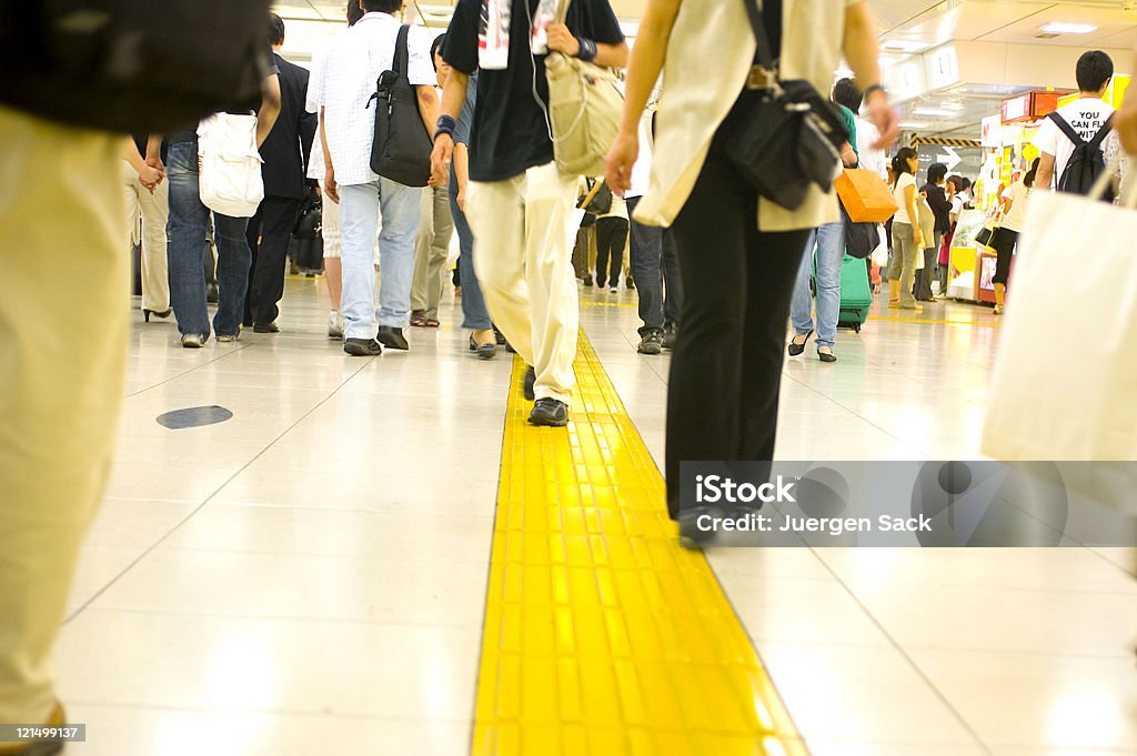 People walking around a shopping mall Consumers... Department Store Stock Photo