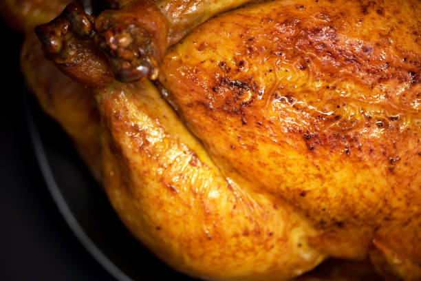 istock Roasted chicken in baking dish. Top view. Copy space. Macro shoot, selective focus 1214991417