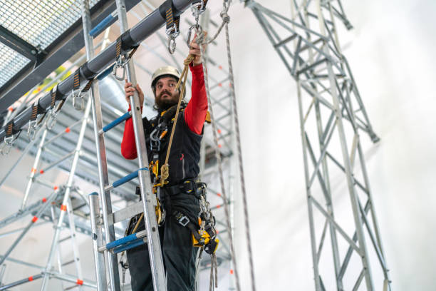 Tough climb Tough climb safety harness photos stock pictures, royalty-free photos & images