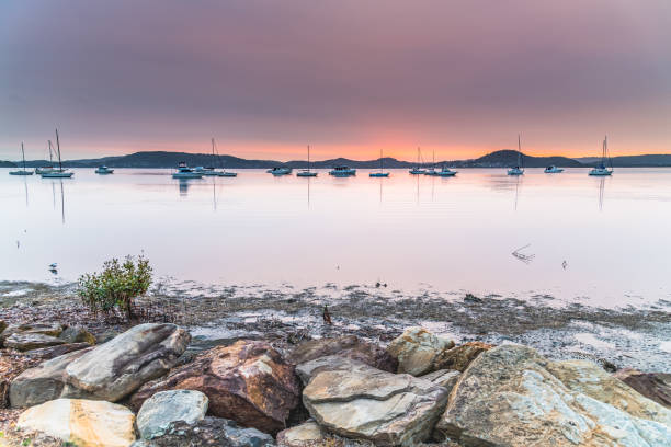 istock A Blanketed Sky, Boats and Reflections on the Bay 1214997106