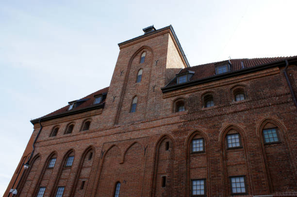istock historic red brick building in Poland Gdask windows ornate 1214998752