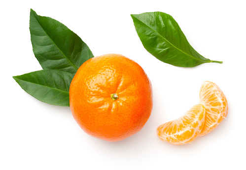 Mandarin with green leaves isolated on white background. Flat lay, top view