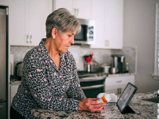 istock Senior Woman on a Virtual Doctor Visit 1215001701
