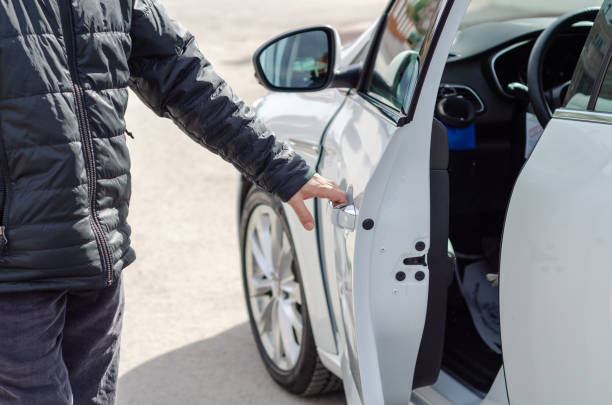 istock The man is getting into a car 1215003189