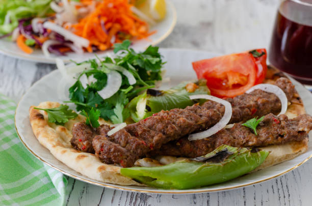 istock Traditional Adana Kebap with salad 1215003372