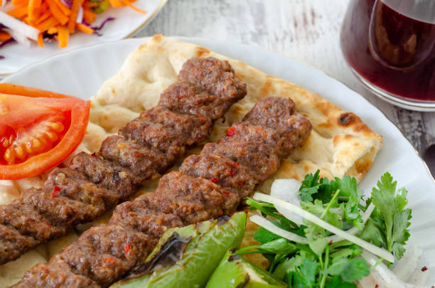 istock Traditional Adana Kebap with salad 1215003373