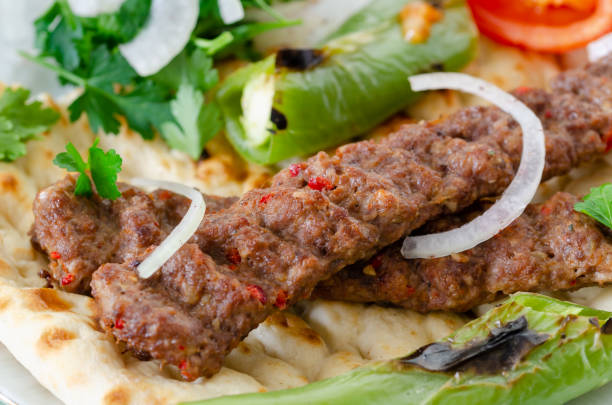 istock Traditional Adana Kebap with salad 1215003404