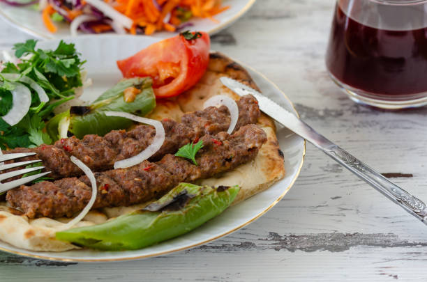 istock Traditional Adana Kebap with salad 1215003529