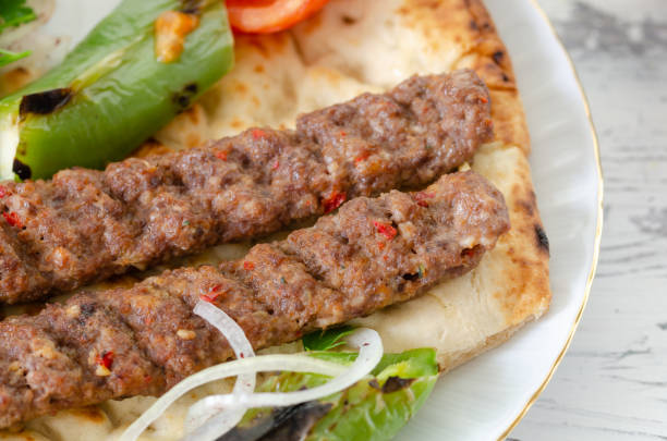 istock Traditional Adana Kebap with salad 1215003540
