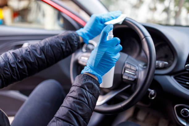 istock Wiping steering wheel after disinfecting it 1215006235