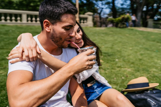 istock Couple drinking yerba mate on date 1215007509