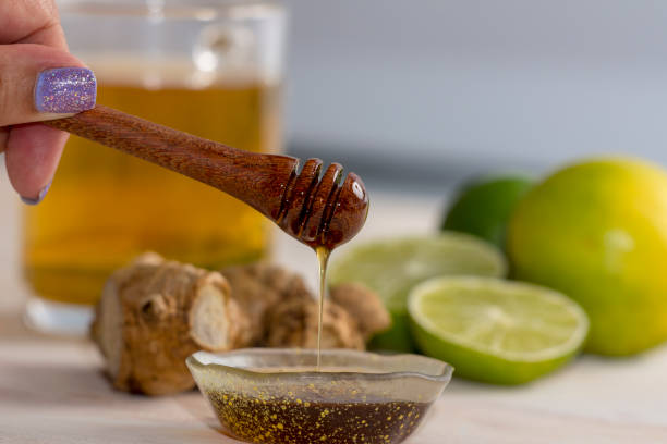 istock glass Tea and Honey cup with lemon, mint and ginger 1215008826