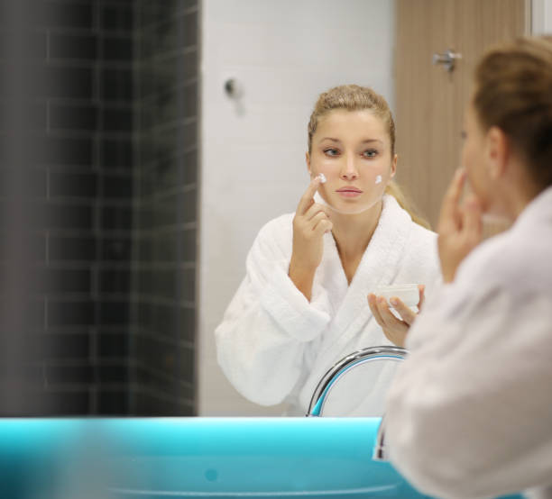 istock Magic anti-aging cream.Applying the cream 1215010234