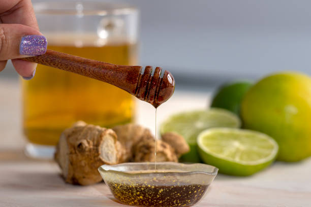 istock glass Tea and Honey cup with lemon, mint and ginger 1215010506