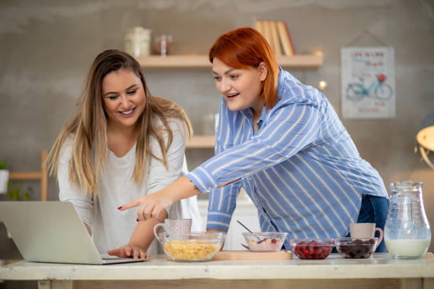 istock Young smiling plus size freelance women. 1215011630