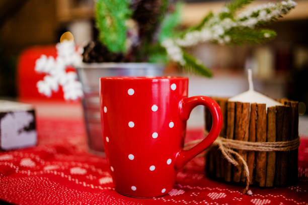istock Beautiful red cup is on the table 1215011729