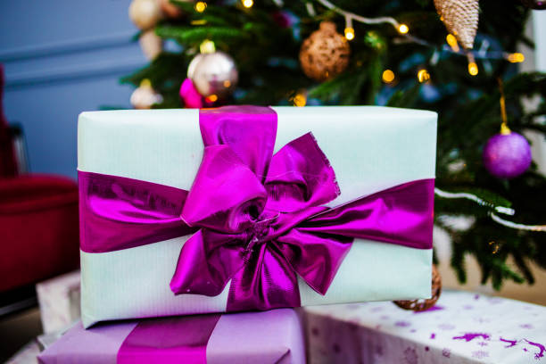 istock Amazing gift box with purple bow 1215012515