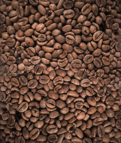 Closeup roasted coffee beans background