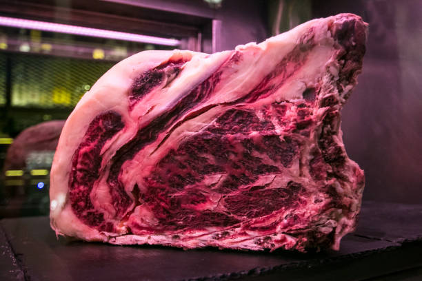 istock Fresh raw meat steak beef parts on a fridge 1215014294