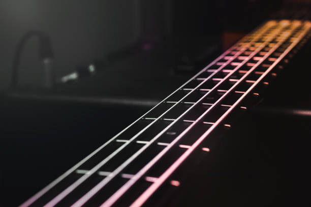 Leisure activity of young musician. She is singing a song in studio and live streaming