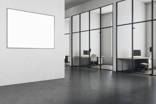 istock Contemporary office in classic interior with blank billboard. 1215020577