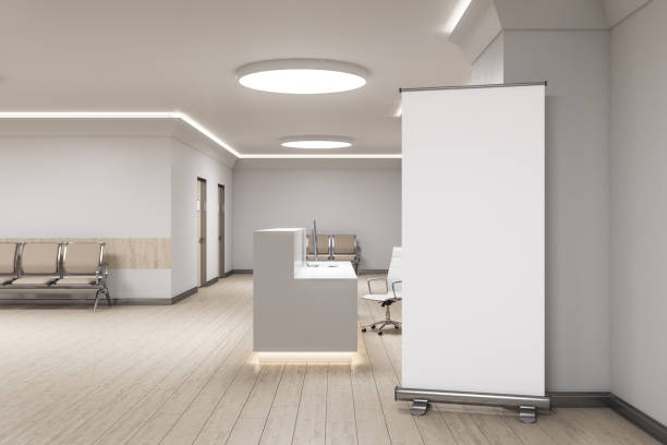 istock Contemporary reception desk and blank poster 1215022184