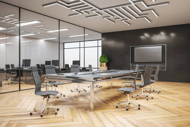 istock Meeting interior room with blank tv screen 1215022260