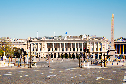 Concorde square (Place de la Concorde) and streets are empty during pandemic Covid 19 in Europe. There are no people and no cars because people must stay at home and be confine. Schools, restaurants, stores, museums... are closed. Paris, in France. March 25, 2020