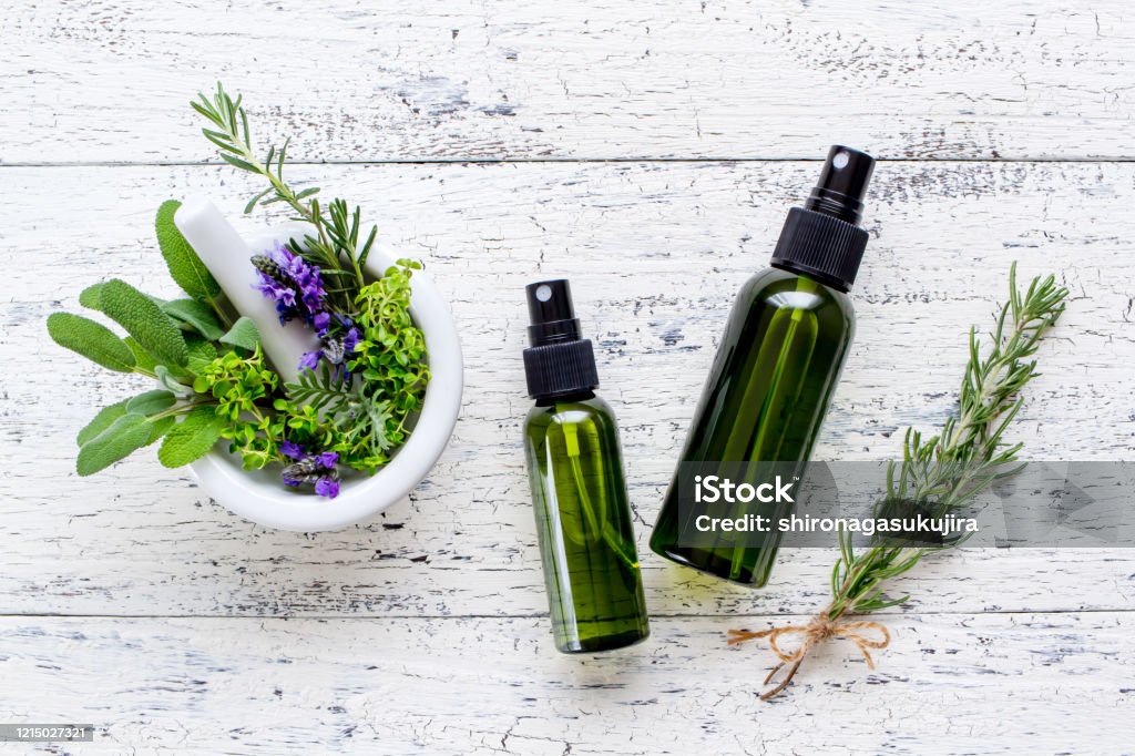 Natural skin care herbal cosmetics Lotion, cosmetics, herbs, plants, natural, green, white background Facial Cleanser Stock Photo