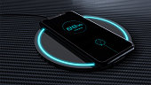 Modern smart phone wireless charging on carbon fibre surface